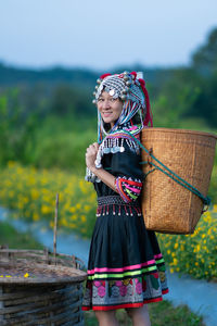 Woman standing on field