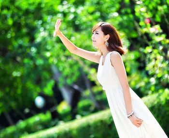 Woman standing in park