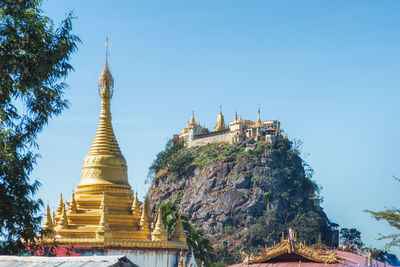 Panoramic view of temple building against sky