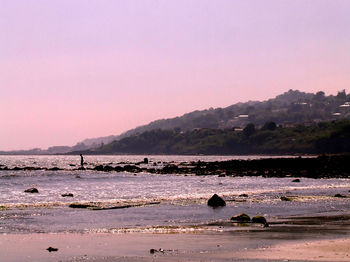 Scenic view of sea against clear sky