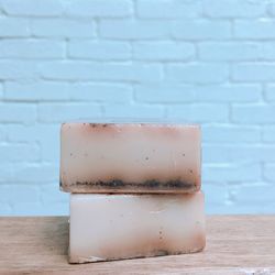 Close-up of soap against brick wall