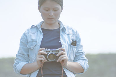 Portrait of man photographing