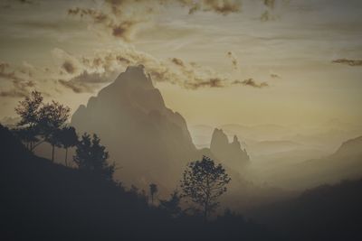 Scenic view of mountains against sky during sunset