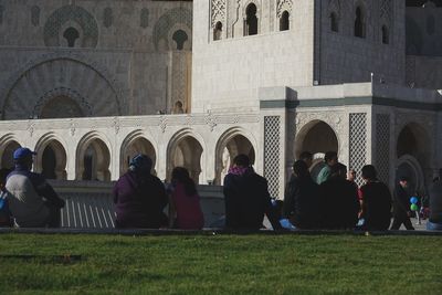 People in front of historical building