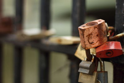 Close-up of padlock on railing