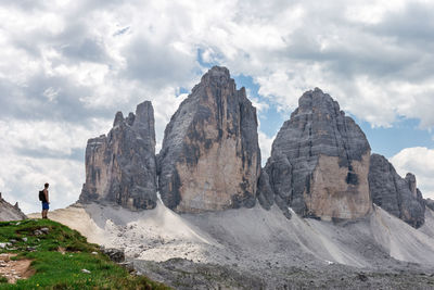 Hiker standing at tre cime di lavaredo