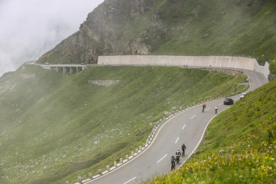 High angle view of road by mountain against sky