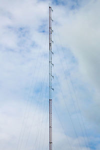 Low angle view of cables against sky