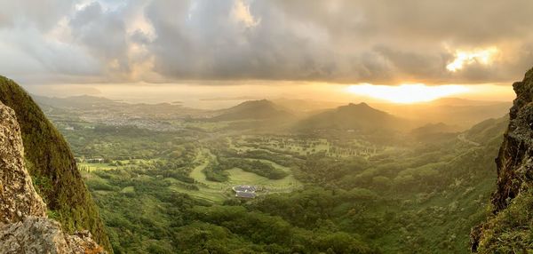 Scenic view of mountains against sky during sunset