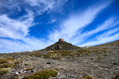 Scenic view of rocky mountain against sky