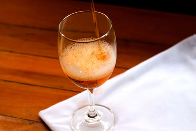 Close-up of beer in glass on table