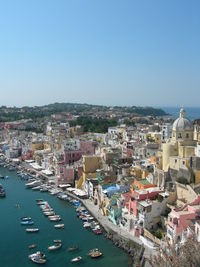 High angle shot of townscape against clear blue sky