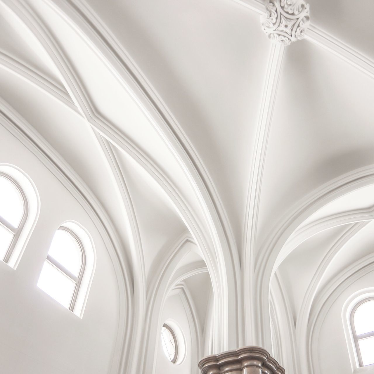 indoors, ceiling, low angle view, architecture, built structure, ornate, design, arch, pattern, architectural feature, religion, church, window, no people, place of worship, art and craft, directly below, spirituality, chandelier