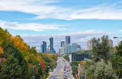 Modern buildings in city against sky