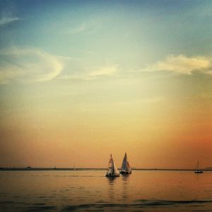 Scenic view of sea against sky during sunset