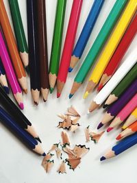 High angle view of colored pencils