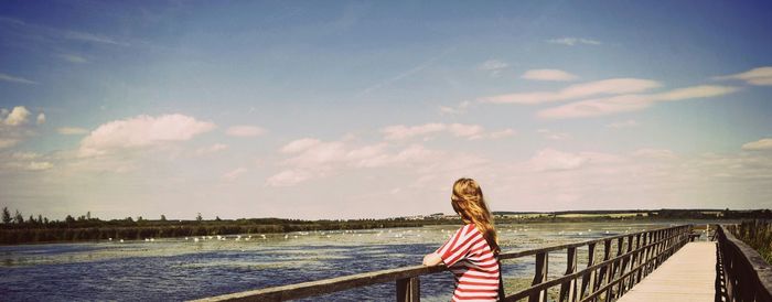 Railing with sea in background