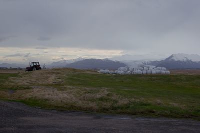 Scenic view of field against sky