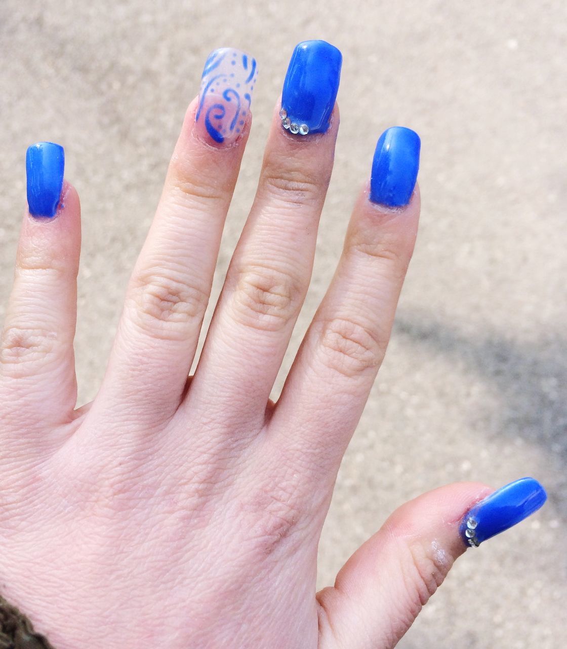 person, part of, human finger, cropped, holding, close-up, unrecognizable person, nail polish, multi colored, focus on foreground, blue, personal perspective, showing, pencil, palm, lifestyles, day