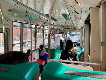 High angle view of people sitting in bus