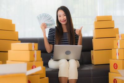 Young woman using phone