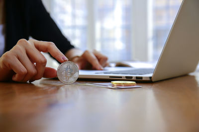 Man using laptop on table