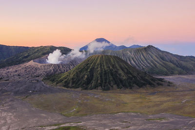 View of volcanic mountain during sunset