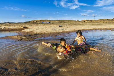 People enjoying in water