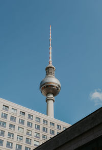 Low angle view of building against clear blue sky