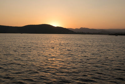 Scenic view of sea against sky during sunset