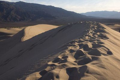 Scenic view of desert against sky