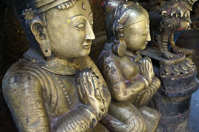 Close-up of buddha statue in temple