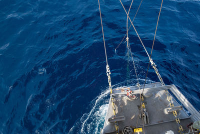 High angle view of ship sailing in sea