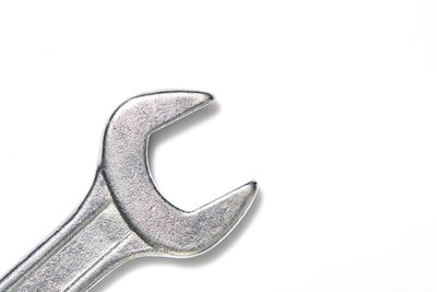 Close-up of metallic structure against white background