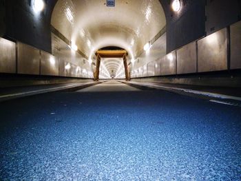 Surface level of empty subway tunnel