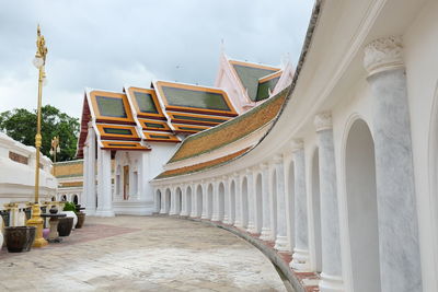 Corridor of building against sky