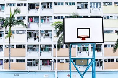 Low angle view of basketball hoop apartment building