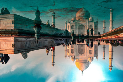 Digital composite image of historic building against sky