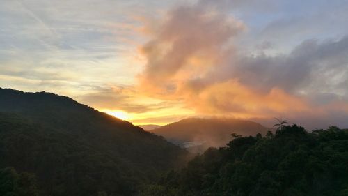 Scenic view of landscape against sky during sunset