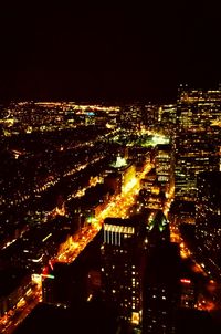 Illuminated cityscape at night