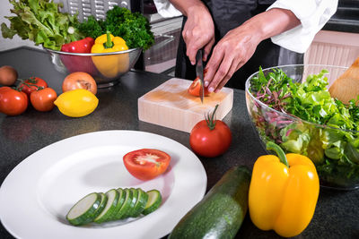 High angle view of fruits and vegetables on cutting board