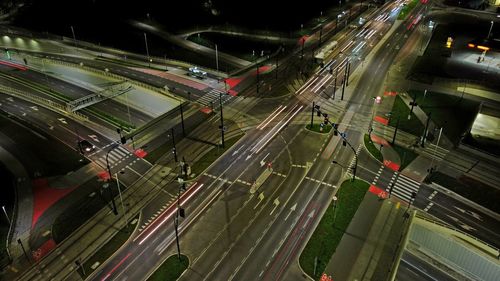 High angle view of light trails on road at night