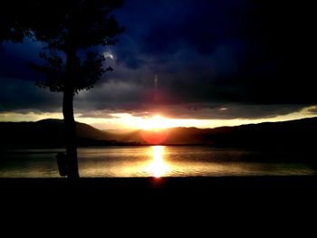 Scenic view of sunset over river