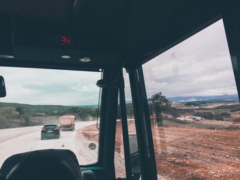Panoramic view of landscape seen through car window