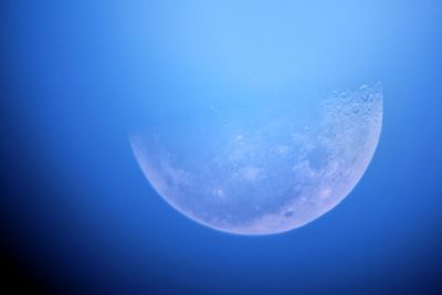 Scenic view of sea against moon at night