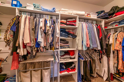 Clothes hanging on rack in store