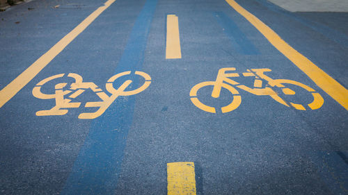 High angle view of road markings on bicycle lane