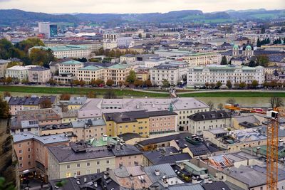 High angle shot of townscape against cityscape