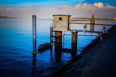 Pier on sea against sky