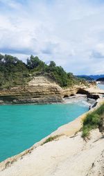 Scenic view of beach against sky